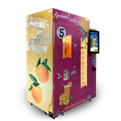 ショッピング モールの自動化された新しいオレンジ ジュースの自動販売機の硬貨の現金払い