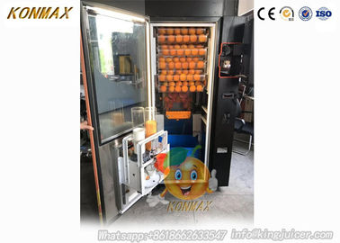 ショッピング モールの商業オレンジ ジュースの自動販売機はアクセプターを鋳造し、注意します